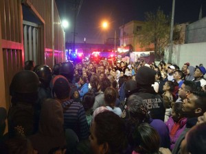 Relatives of inmates gather outside the Topo Chico prison in the northern city of Monterrey in Mexico where according to local media at least 30 people died in a prison riot on February 11, 2016. Riot police and ambulances were deployed at the Topo Chico prison as smoke billowed from the facility. Broadcaster Televisa reported that 30 died while Milenio television spoke of 50 victims, with inmates and prison guards among them.   AFP PHOTO / JULIO CESAR AGUILAR